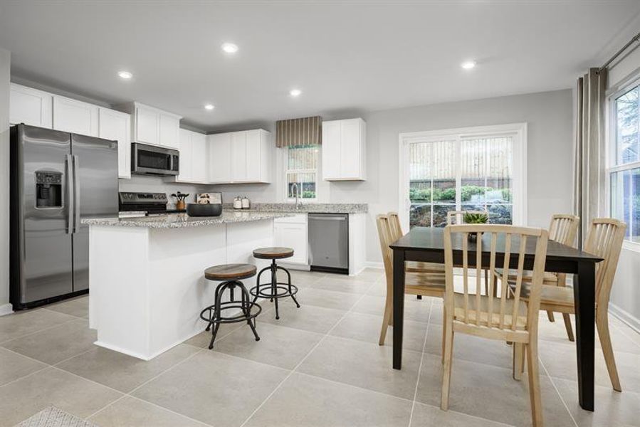 Furnished interior view inside a new home in Seminole Palms Townhomes, Palm Coast (Image 4).