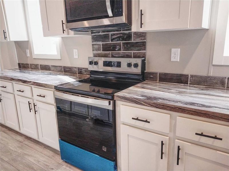 Furnished interior view inside a new home in , Frostproof (Image 7). Furnished interior view inside a new home in , Frostproof (Image 7).