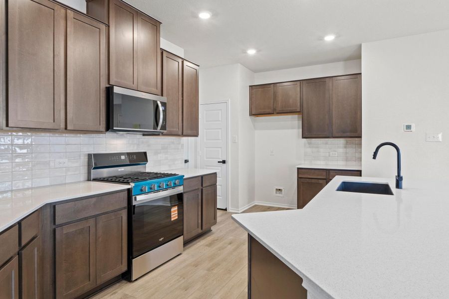 Furnished interior view inside a new home in Salerno - Heritage Collection, Round Rock (Image 12). Furnished interior view inside a new home in Salerno - Heritage Collection, Round Rock (Image 12).