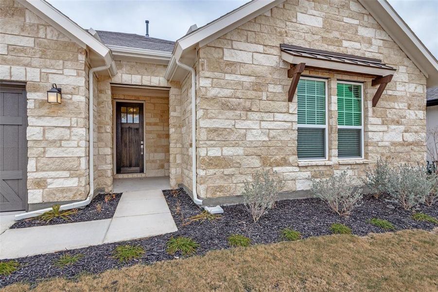 Exterior details and patio area of a home in Sierra Vista at Kelly Ranch, Aledo (Image 23).
