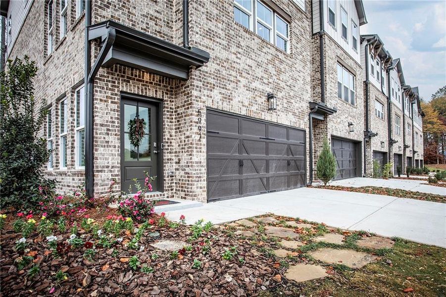Exterior details and patio area of a home in Towne Village at Suwanee Dam, Sugar Hill (Image 3). Exterior details and patio area of a home in Towne Village at Suwanee Dam, Sugar Hill (Image 3).