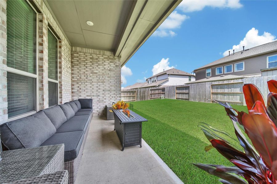 covered back patio, perfect for early mornings and evening wind downs