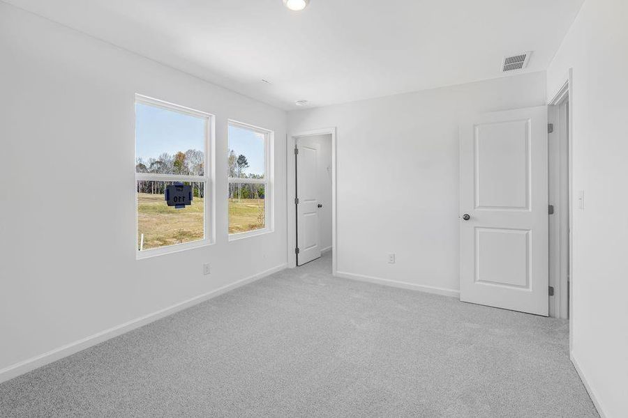 Spacious, unfurnished interior of a new home in Windance Lake, Loganville (Image 35).
