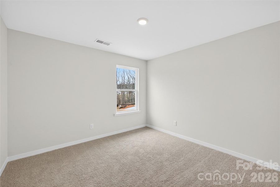 Spacious, unfurnished interior of a new home in Reedy Creek Preserve, Charlotte (Image 21).