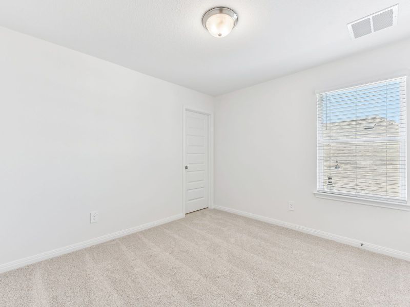 Spacious, unfurnished interior of a new home in Butler Farms - Boulevard Collection, Liberty Hill (Image 18). Spacious, unfurnished interior of a new home in Butler Farms - Boulevard Collection, Liberty Hill (Image 18).
