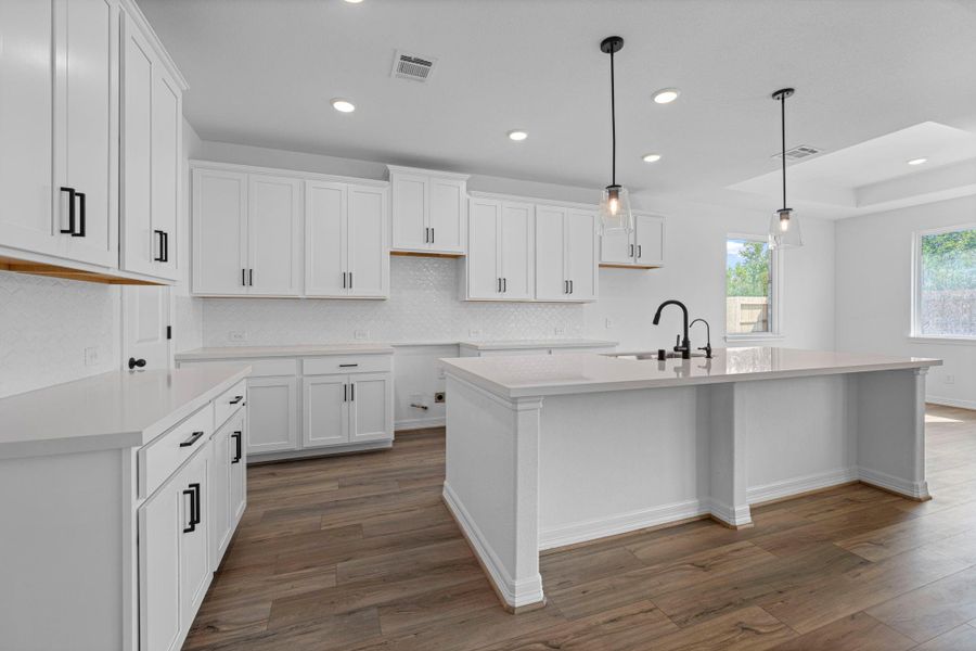 This kitchen is not only a functional space but also has ample storage. Whether you're a seasoned chef or just love to gather and enjoy good food, this kitchen is a dream come true. This kitchen is not only a functional space but also has ample storage. Whether you're a seasoned chef or just love to gather and enjoy good food, this kitchen is a dream come true.