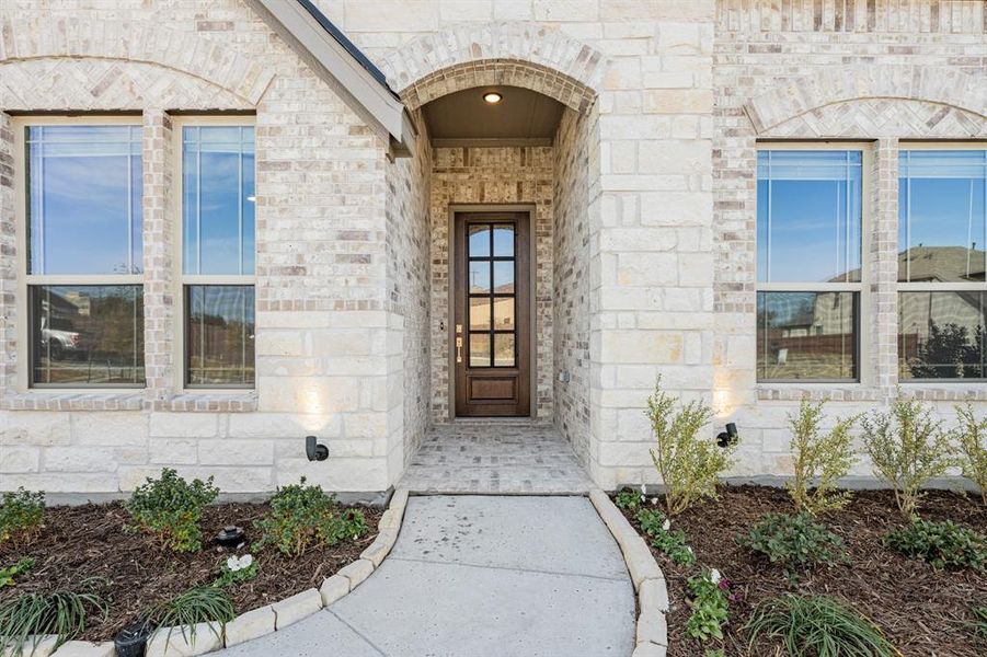 Exterior details and patio area of a home in The Enclave at Parks of Aledo, Aledo (Image 3).