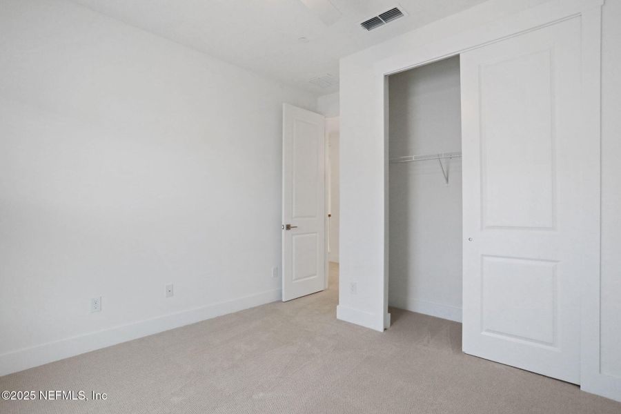 Spacious, unfurnished interior of a new home in North Beach Townhomes, Jacksonville Beach (Image 16).