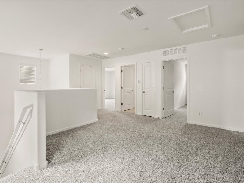 Spacious, unfurnished interior of a new home in Mandarina - Signature Series, Marana (Image 9).