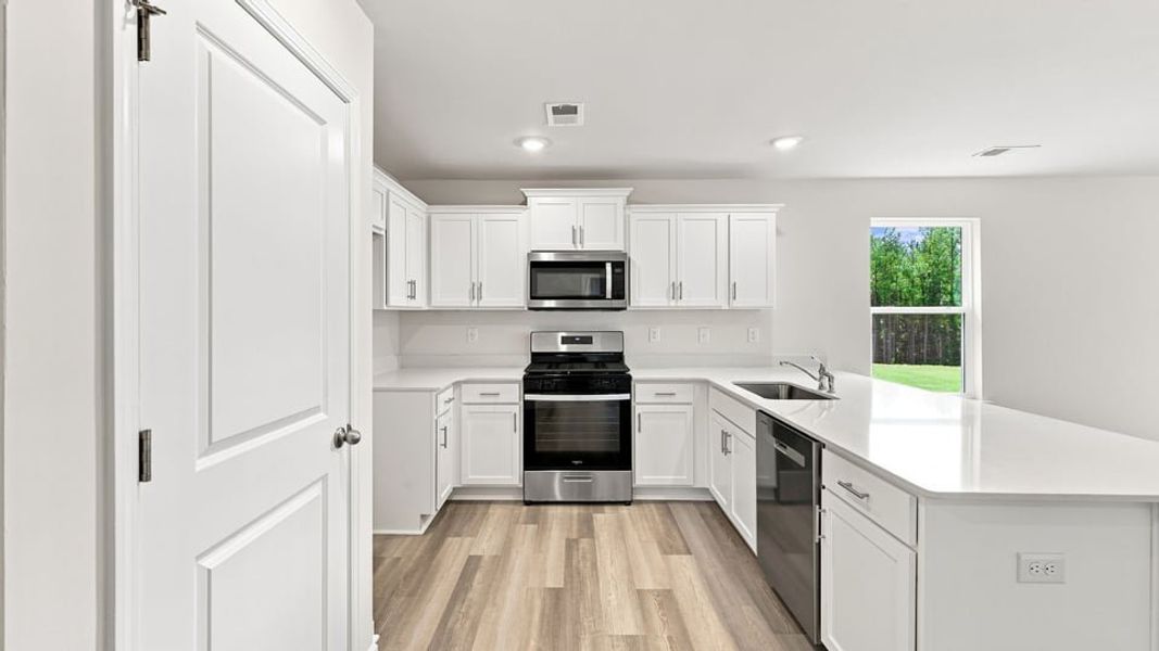 Furnished interior view inside a new home in Tyger Pines, Moore (Image 7).