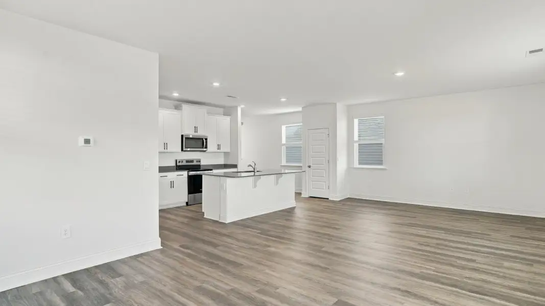 Spacious, unfurnished interior of a new home in The Lakes at North Glynn, Brunswick (Image 14).