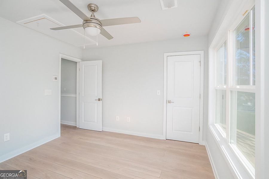 Spacious, unfurnished interior of a new home in The Cottages at East Lanier, Fayetteville (Image 10).