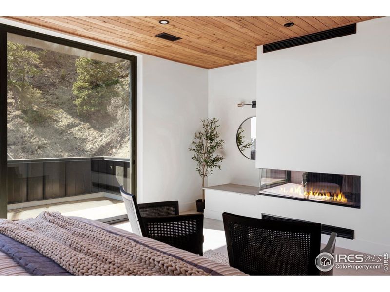 Primary suite fireplace. Primary suite fireplace.