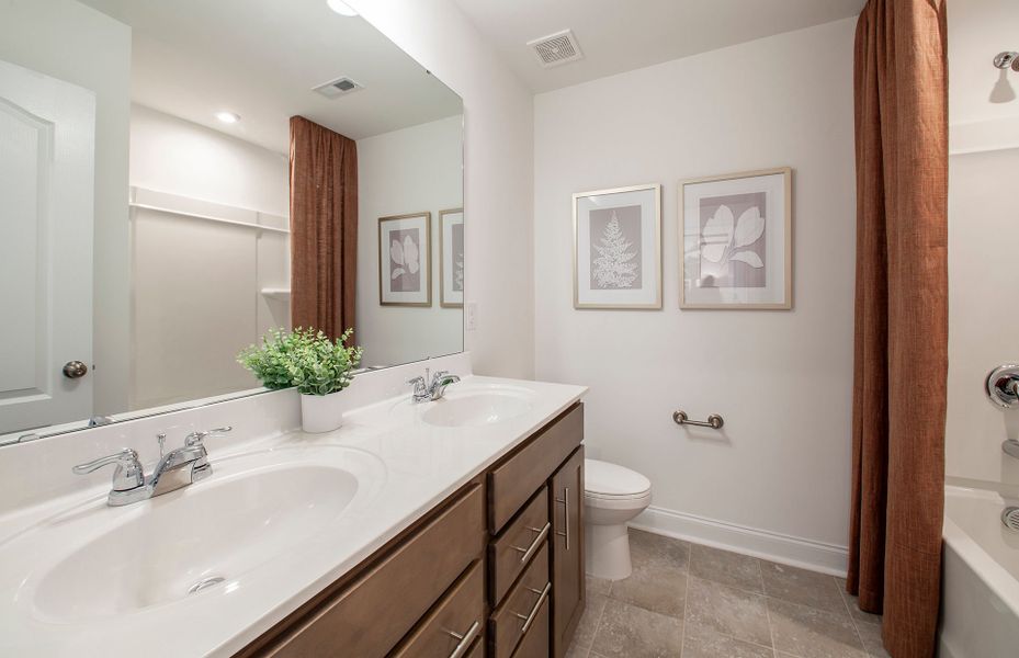 Spacious Secondary Bath with Double Bowl Vanity