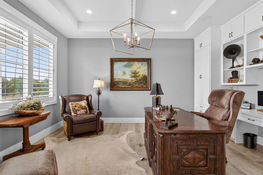 This executive office is right off of the main entryway. This space is large and has so much storage.