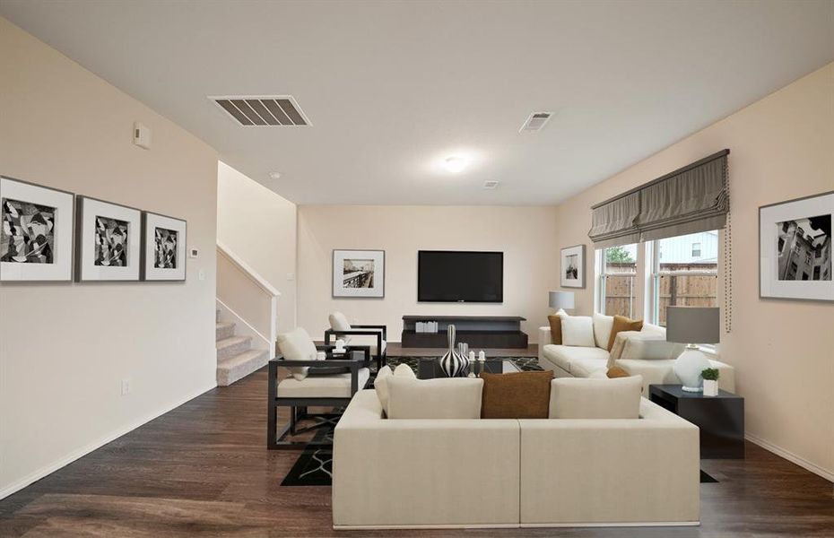 *Model Representation - Spacious gathering room with large windows