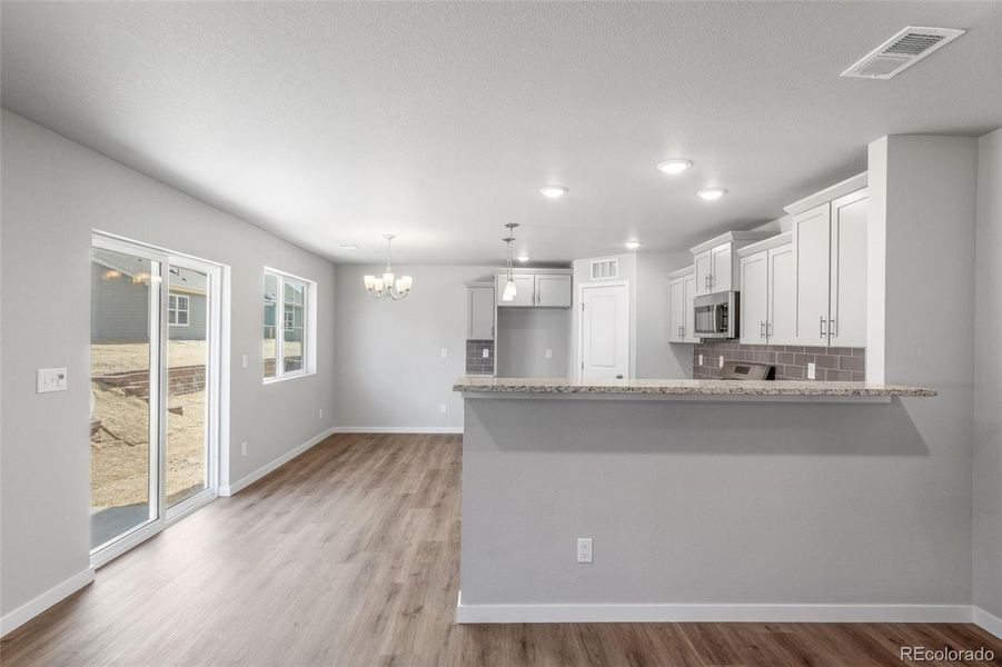 Furnished interior view inside a new home in Sky Ranch – Uptown Collection, Watkins (Image 12).