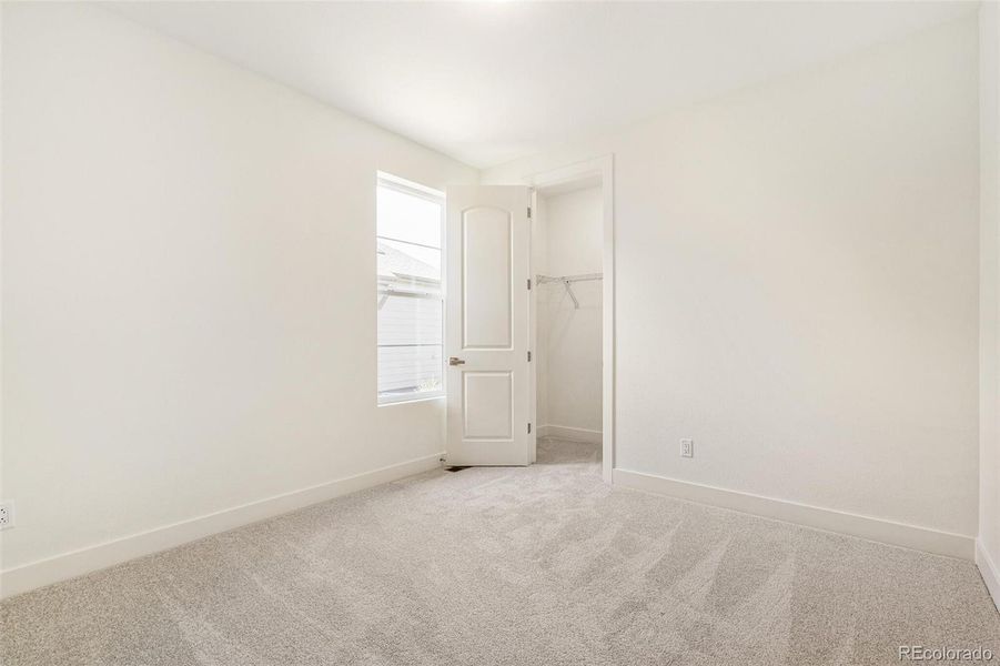 Spacious, unfurnished interior of a new home in Legato, Commerce City (Image 25).