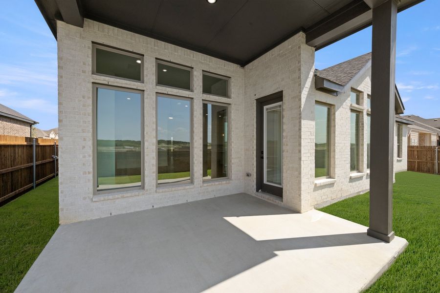 Exterior details and patio area of a home in Panchasarp Farms, Burleson (Image 19).
