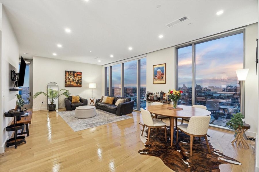 Experience the ultimate in luxury living in this exquisitely designed corner 2-bedroom condo, where expansive floor-to-ceiling windows flood the space with natural light and offer breathtaking views. Custom features include engineered hardwood floors, Creative Blinds, B-Design Closets and outside pet station.