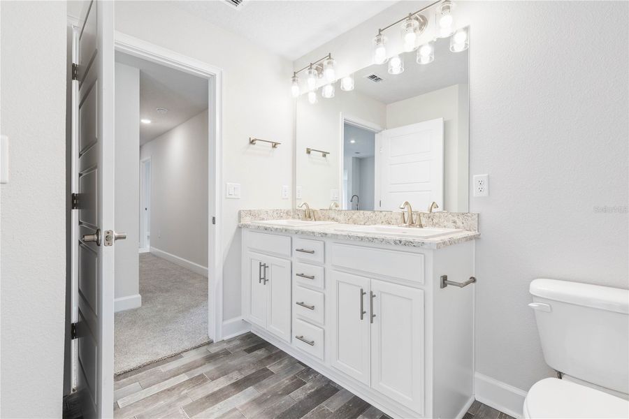 Furnished interior view inside a new home in Orange Blossom Hills, Summerfield (Image 11).