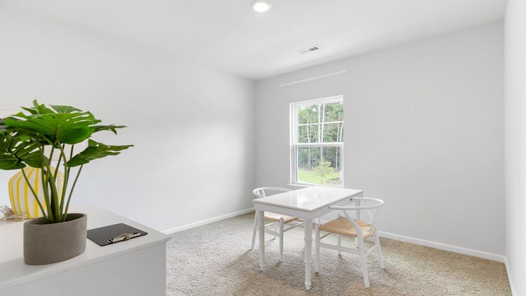 Furnished interior view inside a new home in The Crossing at St. James, Summerville (Image 22).