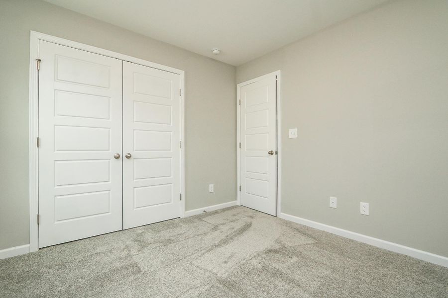 Representative unfurnished interior of a home built from the Palmer Plus by RiverWILD Homes in Riverwood Ranch, Clayton (Image 14).