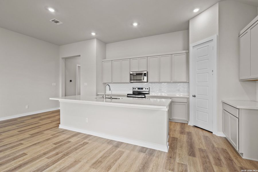 Furnished interior view inside a new home in Megan's Landing, Castroville (Image 13).