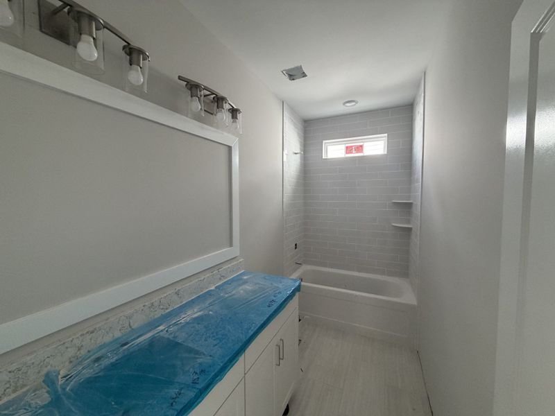 In-progress construction of a new home in The Sanctuary at Sunset Beach, Sunset Beach, NC (Image 12).