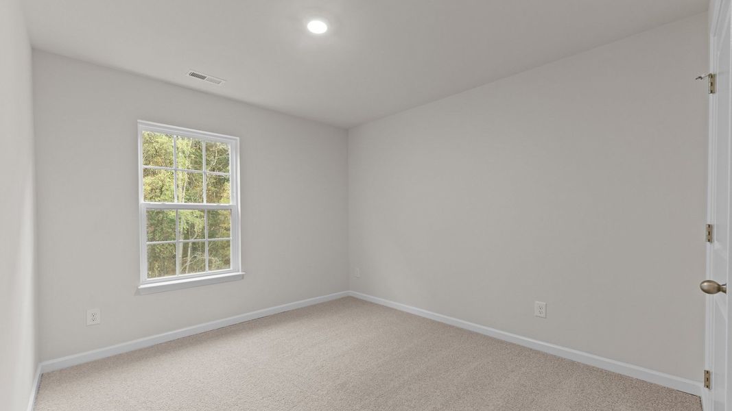 Spacious, unfurnished interior of a new home in Madeline Farm, New Bern (Image 23).