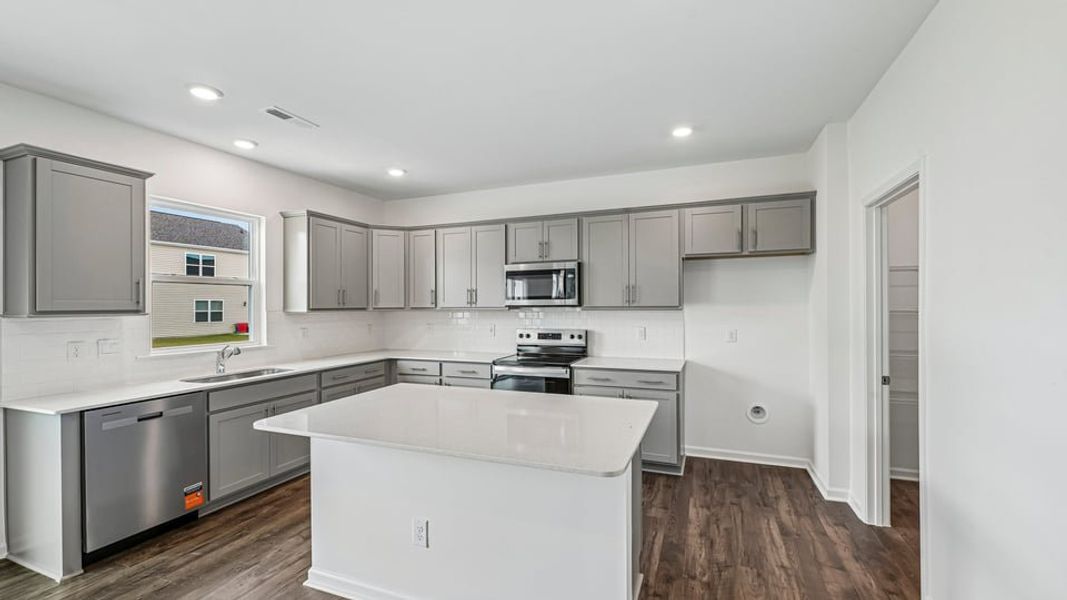 Furnished interior view inside a new home in Shahbain Reserve, Raeford (Image 5).
