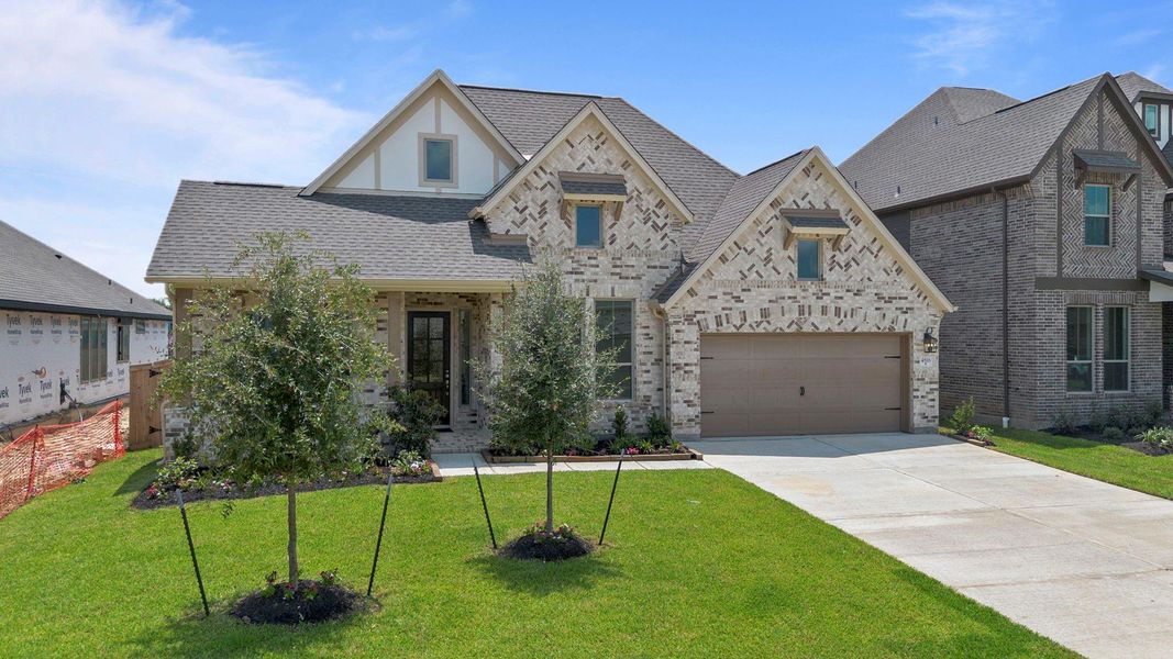 Front exterior of a new home in Coastal Point, League City, TX, highlighting curb appeal (Image 20).