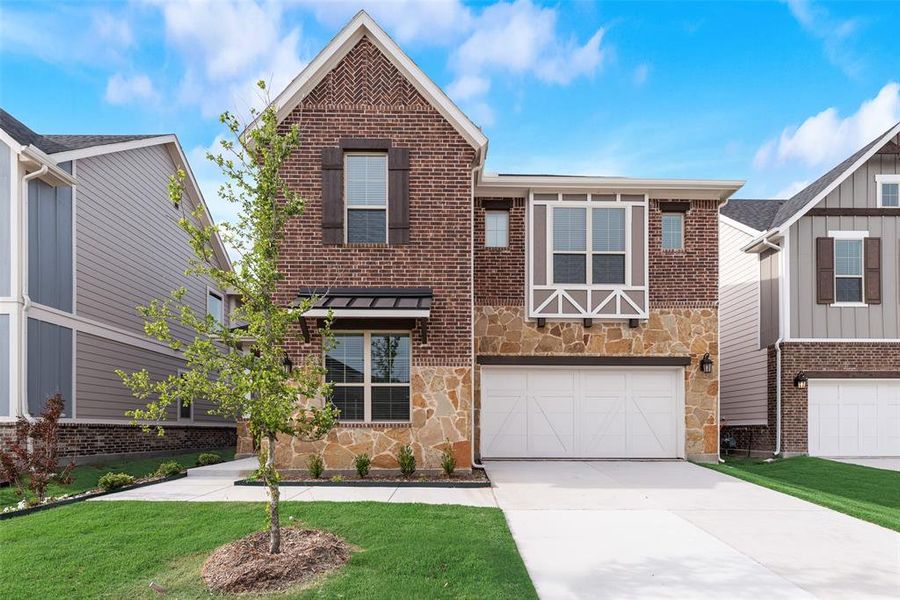 Front exterior of a new home in Bayside, Rowlett, TX, highlighting curb appeal (Image 18).