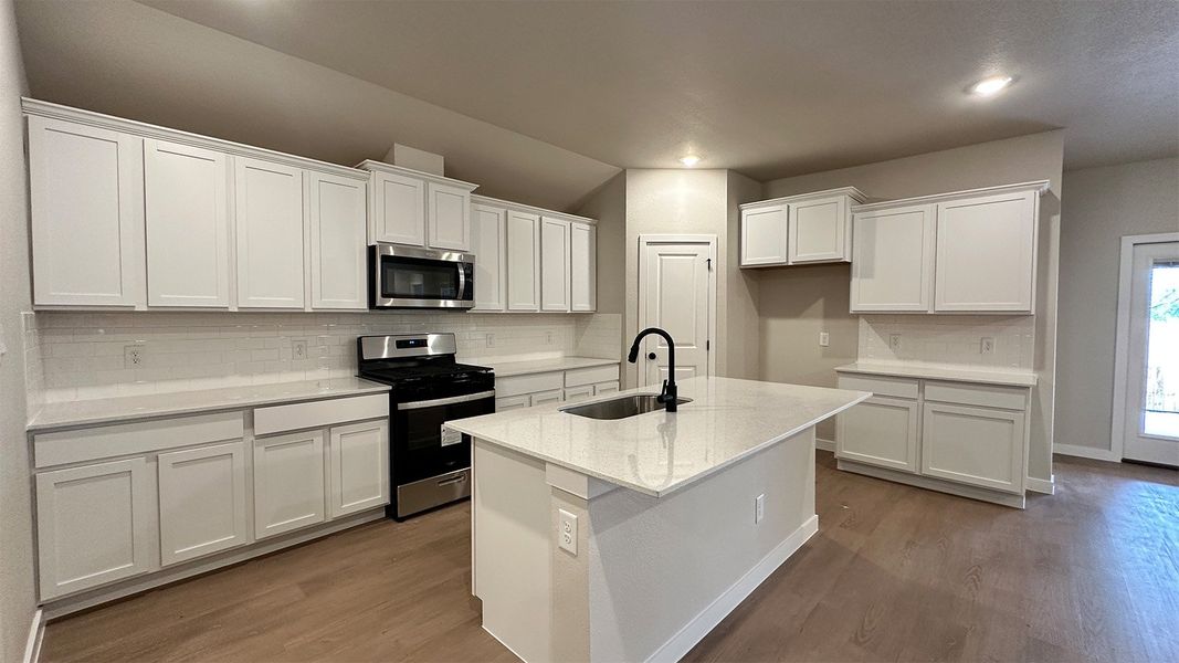 Furnished interior view inside a new home in The Lakes Northwest, Robstown (Image 7).
