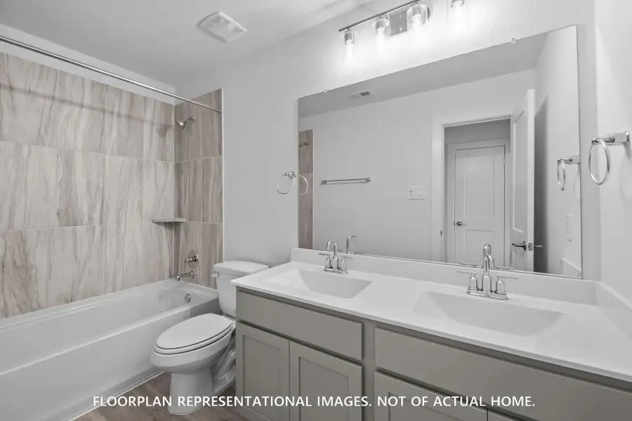 Furnished interior view inside a new home in Marvida, Cypress (Image 10).