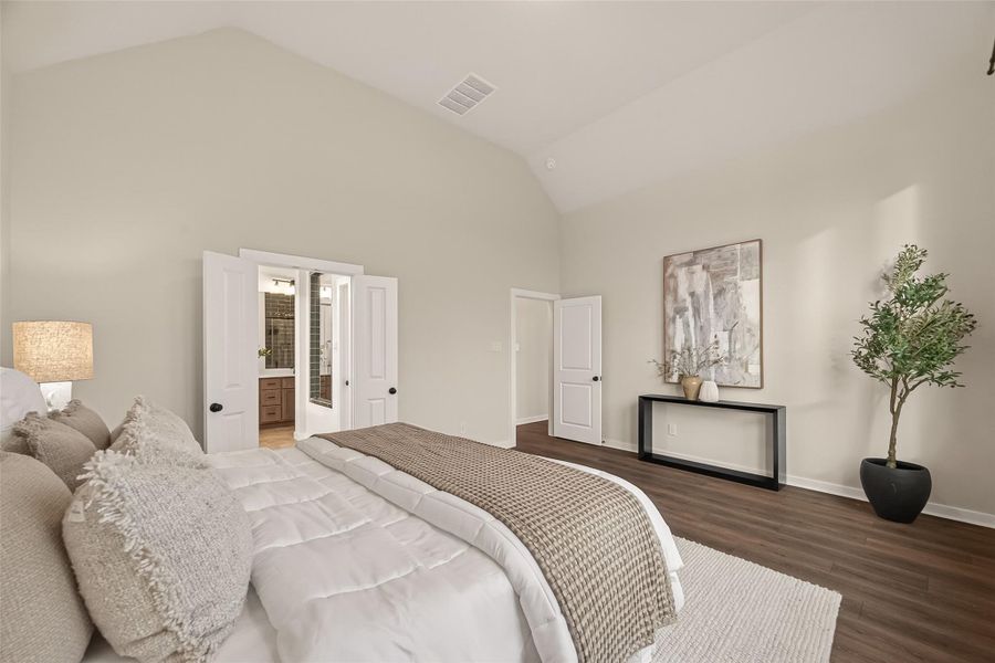 Primary bedroom looking toward the primary bath.