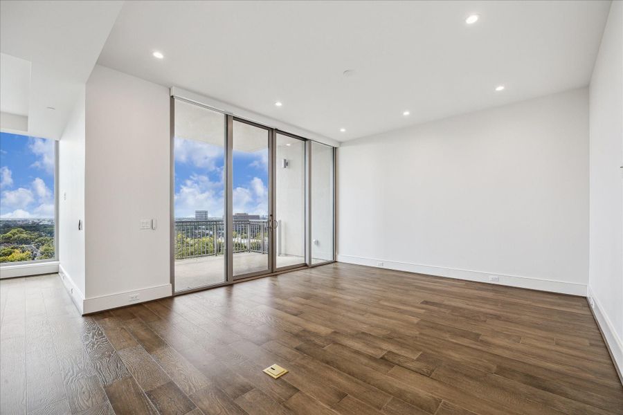 Alternate view of the living area with outdoor balcony access Alternate view of the living area with outdoor balcony access