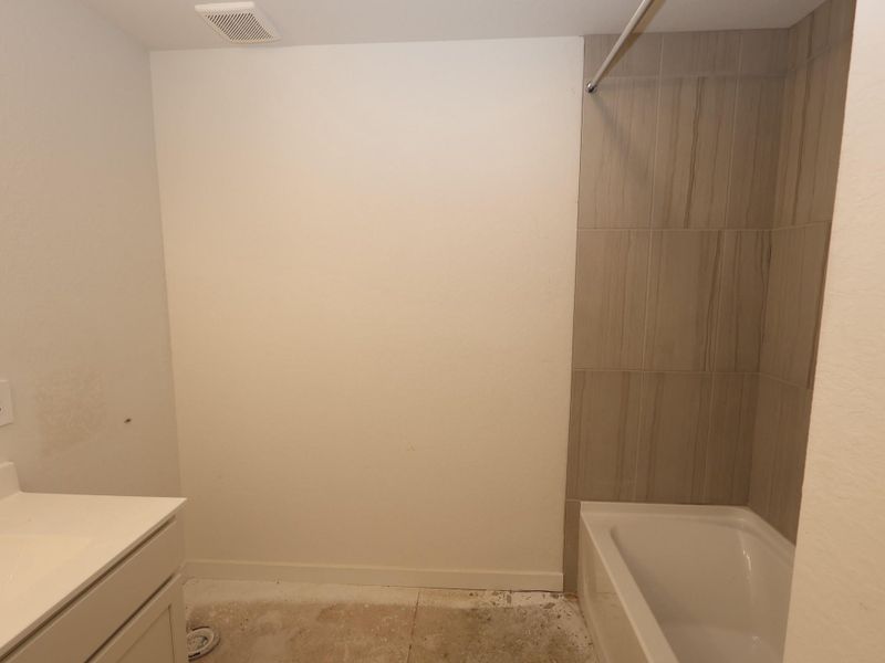 In-progress construction of a new home in Pinewood at Grand Texas, New Caney, TX (Image 16).