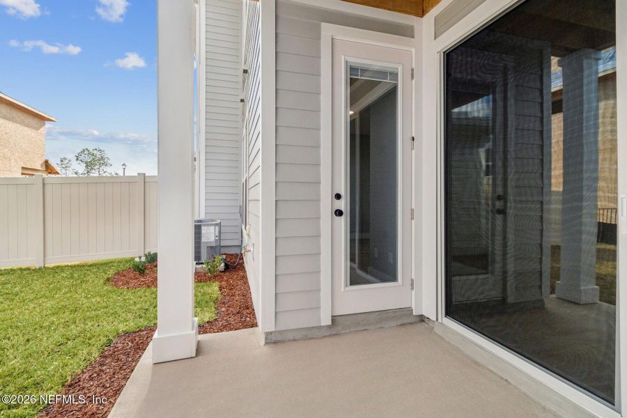 Exterior details and patio area of a home in Kettering at eTown - Traditional Collection, Jacksonville (Image 21). Exterior details and patio area of a home in Kettering at eTown - Traditional Collection, Jacksonville (Image 21).