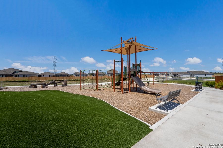 Front exterior of a new home in Navarro Ranch: Coastline Collection, Seguin, TX, highlighting curb appeal (Image 19). Front exterior of a new home in Navarro Ranch: Coastline Collection, Seguin, TX, highlighting curb appeal (Image 19).