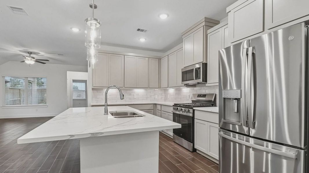 Furnished interior view inside a new home in Meridiana Townhomes, Manvel (Image 15).