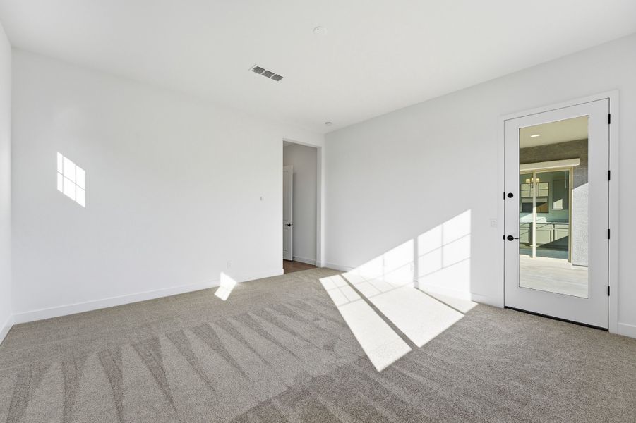 Spacious, unfurnished interior of a new home in Ellsworth Ranch, Queen Creek (Image 32).