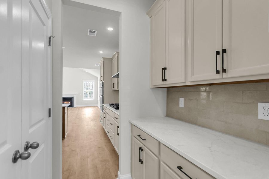 Furnished interior view inside a new home in Tidewater at Lakes of Cane Bay, Summerville (Image 5).