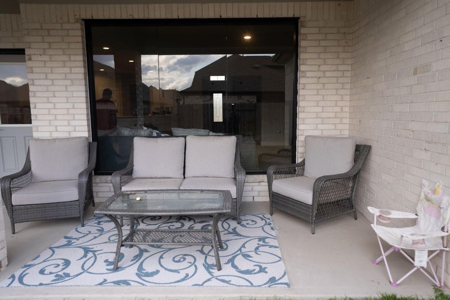Exterior details and patio area of a home in Sunterra, Katy (Image 31).