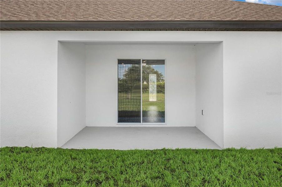 Exterior details and patio area of a home in Citrus Place, Babson Park (Image 3).