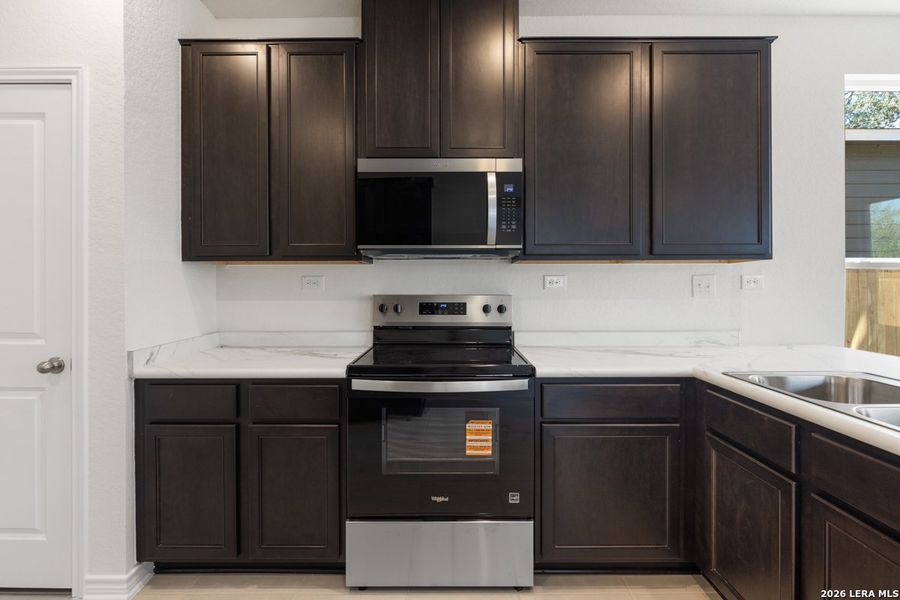 Furnished interior view inside a new home in Spanish Trails Villas, San Antonio (Image 7).