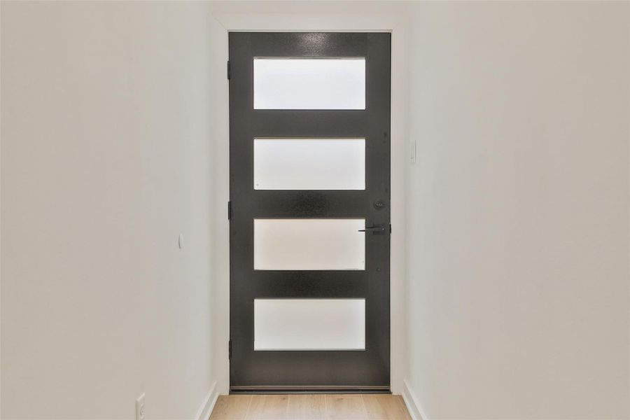 Welcome guests with a chic, modern five-panel front door.