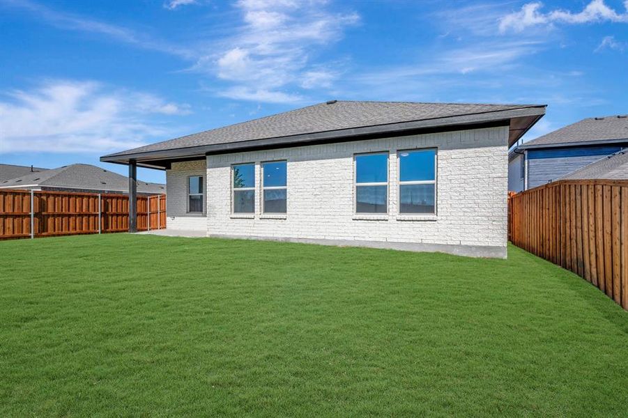 Exterior details and patio area of a home in Aspire at Noble Ridge, Howe (Image 23).