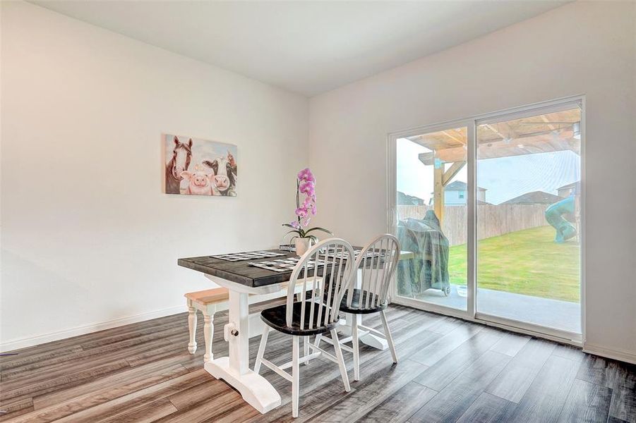 Breakfast area and large sliding glass door.