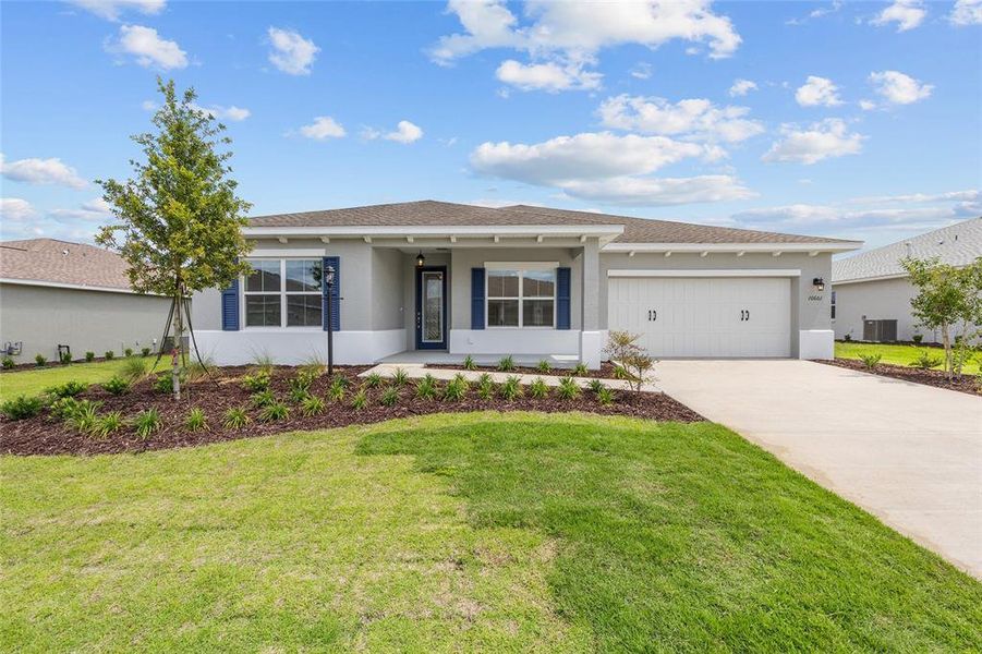 Front exterior of a new home in , Ocala, FL, highlighting curb appeal (Image 17).